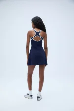 Turn heads in the Ultimate Binding Detail Dress – Navy, a sleek and sophisticated statement piece for any occasion.