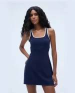 Turn heads in the Ultimate Binding Detail Dress – Navy, a sleek and sophisticated statement piece for any occasion.