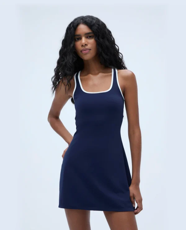 Turn heads in the Ultimate Binding Detail Dress – Navy, a sleek and sophisticated statement piece for any occasion.