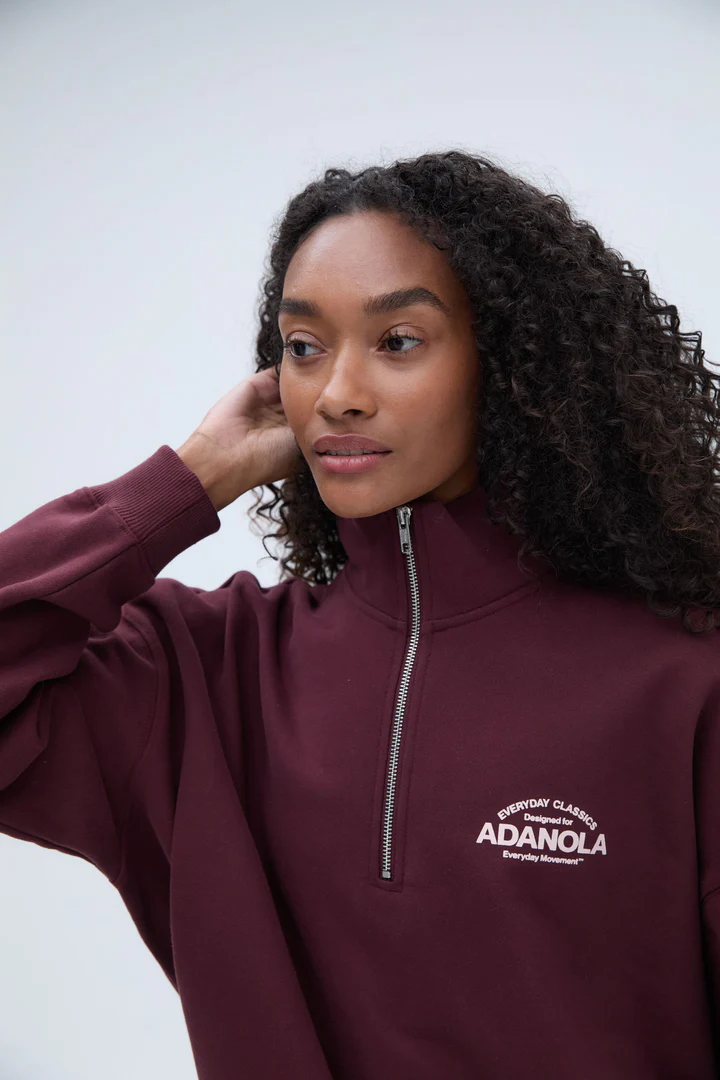 Elevate your streetwear game with the Classics Oversized Funnel Neck Zip Sweatshirt in rich burgundy for a bold, cozy look.