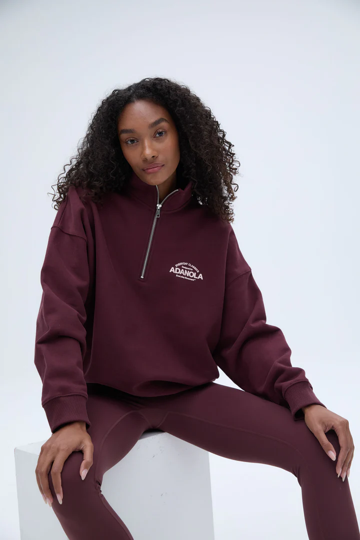 Elevate your streetwear game with the Classics Oversized Funnel Neck Zip Sweatshirt in rich burgundy for a bold, cozy look.